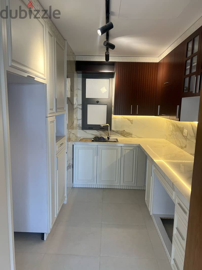Apartment for sale 156 m prime location View Landscape Super Lux finishing Kitchen Air Conditioners in Compound Eastown 13