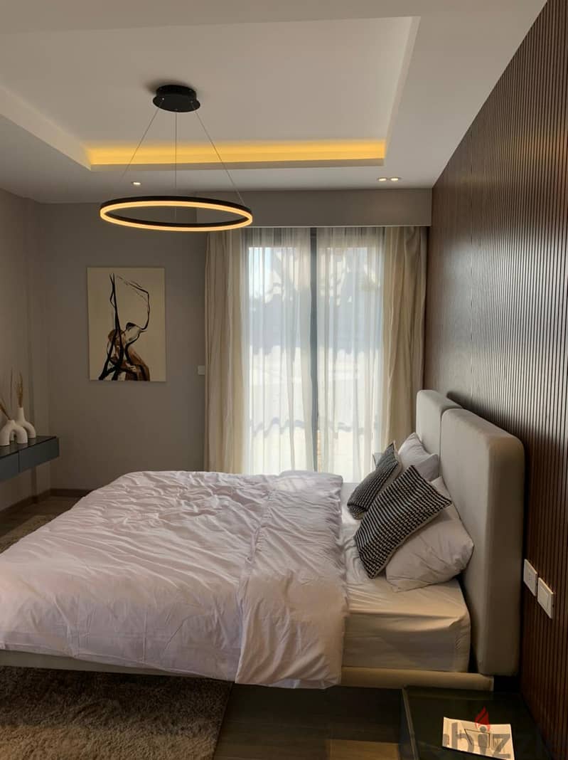Apartment 175m next to Hyper One, immediate receipt, finished with air conditioners, including club and garage in Sheikh Zayed, Dorra Village West, in 5