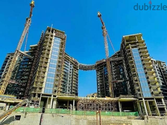 For sale, fully finished apartment + adaptations, wonderful view, in Zed West Towers, Sheikh Zayed, next to Al-Ahly Club, with a view of Central Park 7