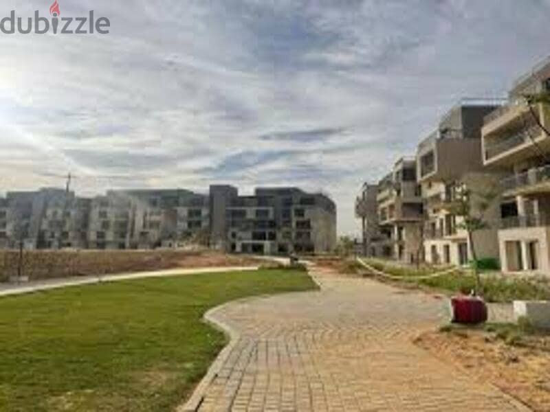 The largest area of ​​an apartment with garden on an open view, in Sodic East, 4 bedrooms, with the best price 9
