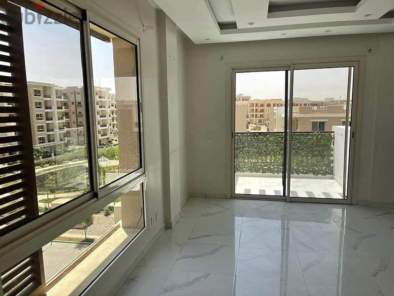 A luxury 115 m penthouse apartment for sale in installments in front of Cairo Airport in Taj City  Landscape view 10