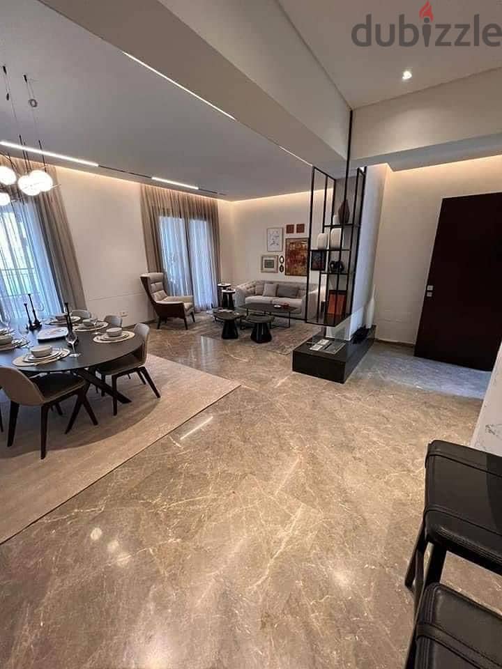 Receive a 197 sqm private townhouse villa with a garden in District 5, Fifth Settlement, with a down payment of 10,800,000 and installments over the l 4