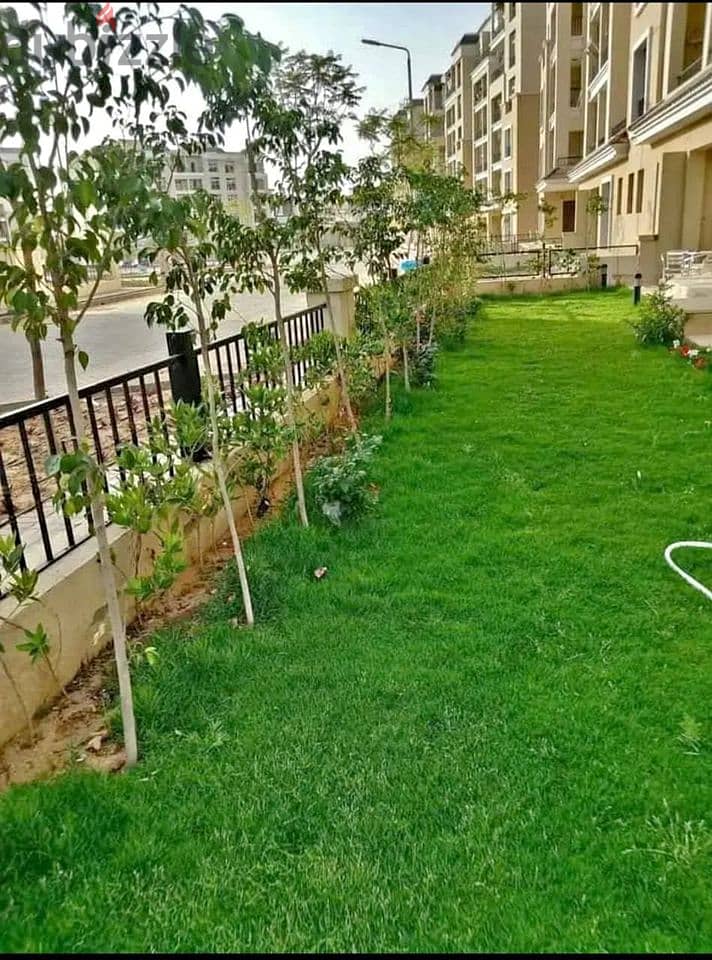 For sale, ground and first duplex with garden (128 m) in New Cairo, next to madinty , Compound Sarai 1