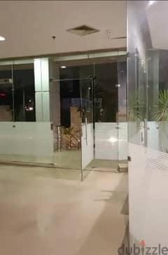 Shop for rent 123m on the main Mohamed Naguib axis