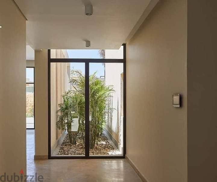 Townhouse Corner for sale in O WEST Compound has a private entrance and is located near Sheikh Zayed City and the 26 Yolo Corridor. 3