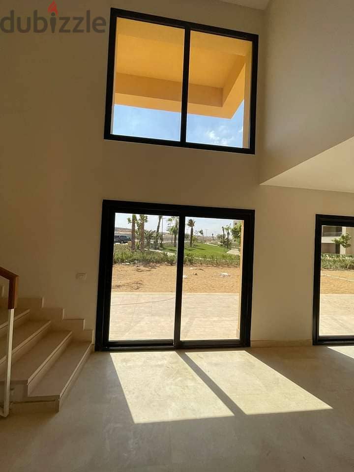 Townhouse Corner for sale in O WEST Compound has a private entrance and is located near Sheikh Zayed City and the 26 Yolo Corridor. 4