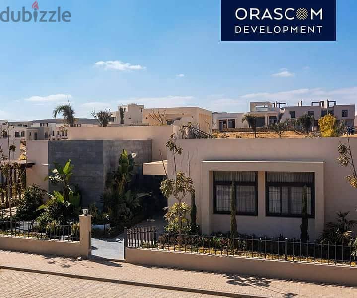 Townhouse Corner for sale in O WEST Compound has a private entrance and is located near Sheikh Zayed City and the 26 Yolo Corridor. 6