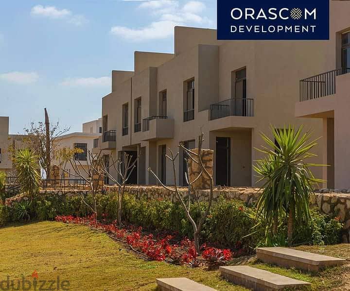 Townhouse Corner for sale in O WEST Compound has a private entrance and is located near Sheikh Zayed City and the 26 Yolo Corridor. 7