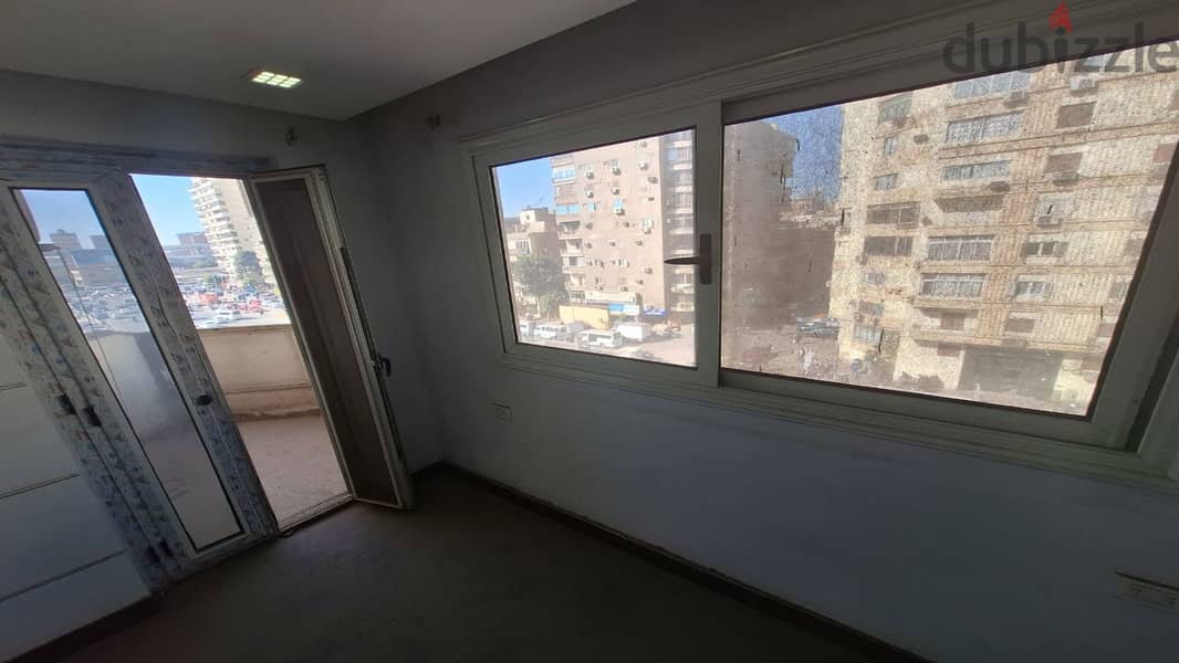 شقة 4 غرف كاملة التشطيب علي شارع التحرير الرئيسي مناسبة جدا للاستثمار 16