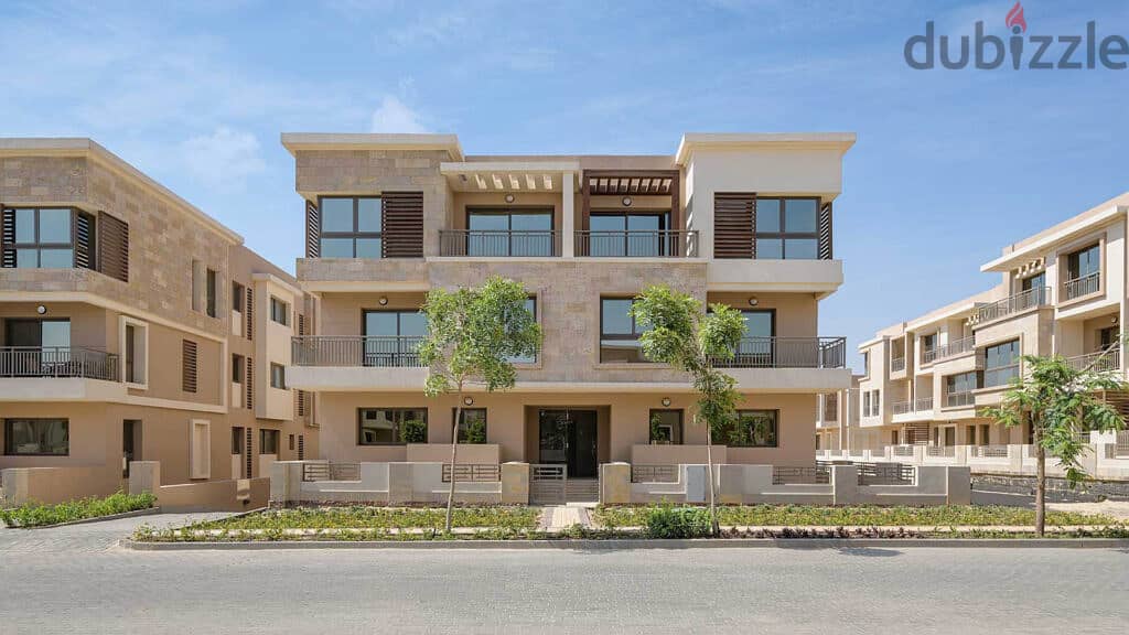 4 bedrooms with a spacious garden for sale on the Suez Road directly next to Madinaty, 205 meters, open and clear sea view in Sarai Compound from Nasr 6