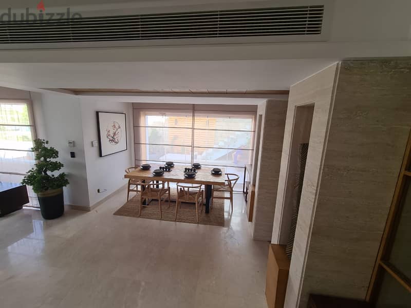 For sale, a fantastic roof view villa, close receipt, next to the Mall of Arabia, in Mountain View, iCity October, directly on the Boulevard axis. 4