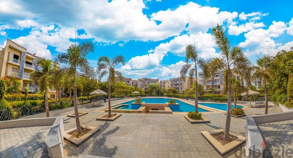 Ground floor apartment with garden, immediate receipt, in the heart of Golden Square, minutes from the AUC, installments over 5 yearsشقة إستلام فوري 5