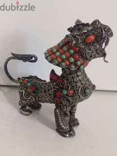 chinese silver dragon with gem stones
