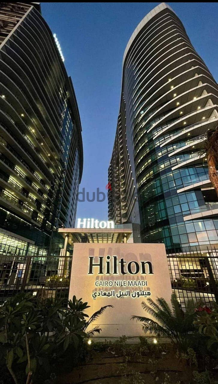 For sale, first row apartment on the Nile, immediate receipt, fully finished, in Nile Pearl Towers, managed by Hilton, in installments. 0