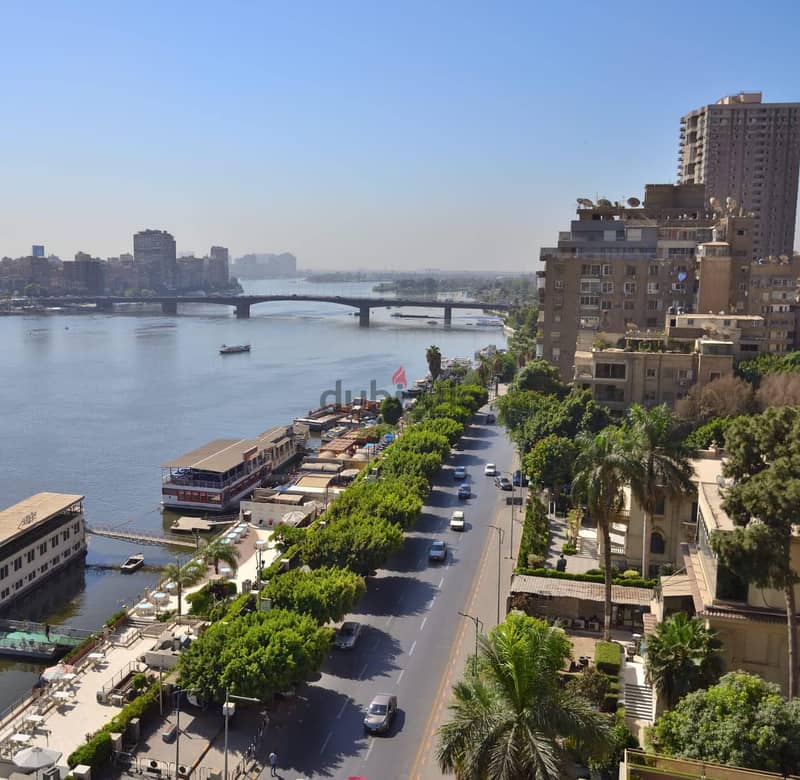 For sale, first row apartment on the Nile, immediate receipt, fully finished, in Nile Pearl Towers, managed by Hilton, in installments. 4