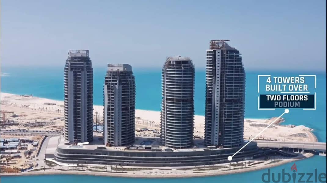 I own an apartment in New Alamein Towers with a panoramic view of the sea and the beach with only 10% down payment 8