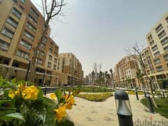 Apartment for sale immediate delivery semi-furnished with kitchen and air conditioners Resale Al Maqsad New Capital Prime location close to services 0