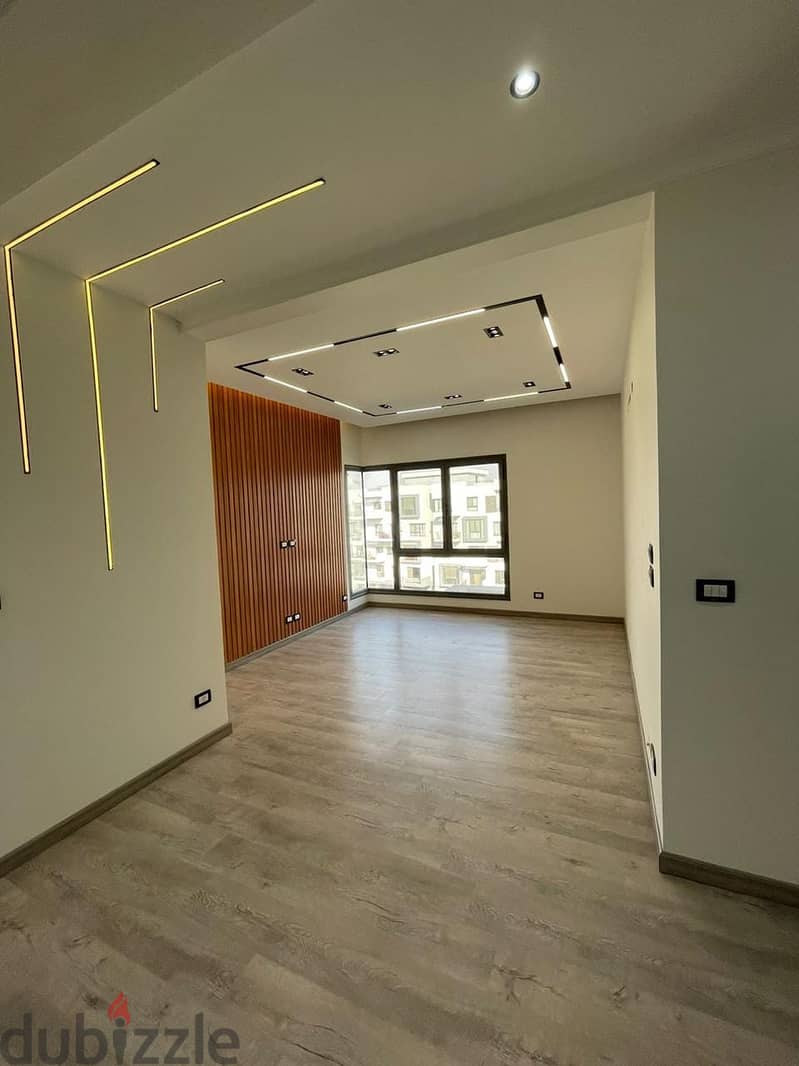 Apartment for sale immediate delivery semi-furnished with kitchen and air conditioners Resale Al Maqsad New Capital Prime location close to services 1