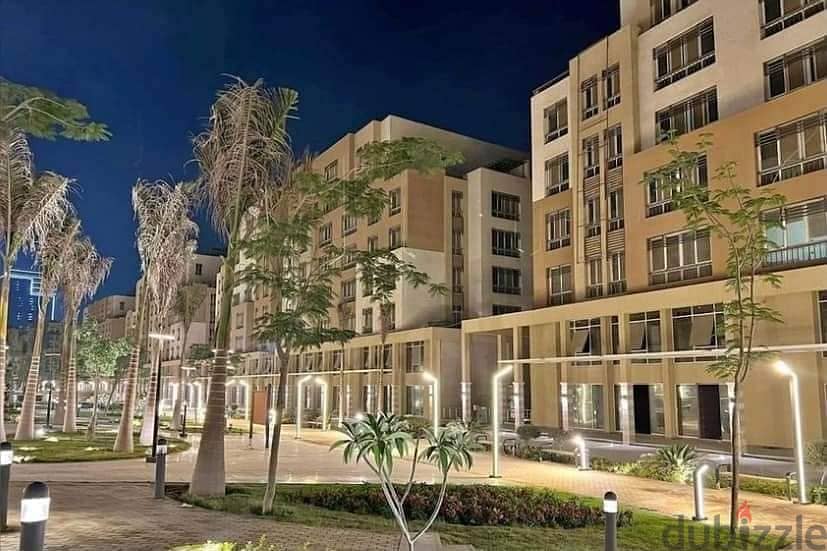 Apartment for sale immediate delivery semi-furnished with kitchen and air conditioners Resale Al Maqsad New Capital Prime location close to services 4