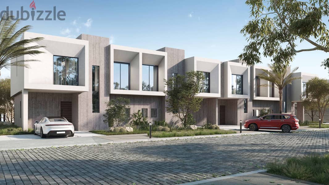 Seize the opportunity and book a 211 sqm townhouse with a garden and a 30% discount, fully finished in the heart of New Zayed on Dabaa Road overlookin 7