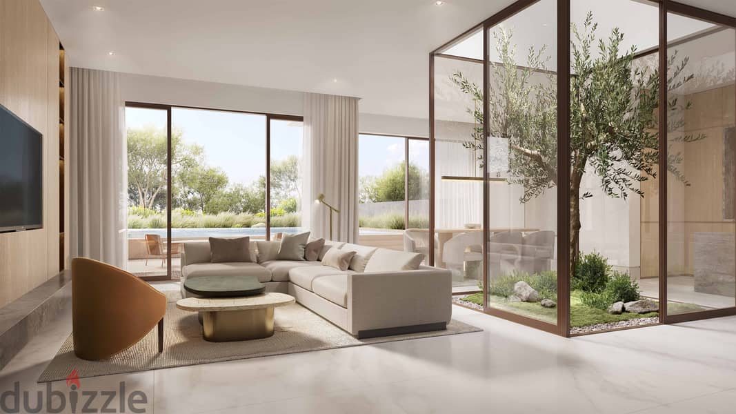 Seize the opportunity and book a 211 sqm townhouse with a garden and a 30% discount, fully finished in the heart of New Zayed on Dabaa Road overlookin 10