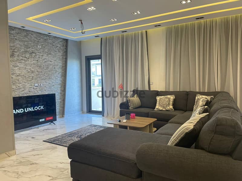 Fully-furnished apartment 210 m. for rent ultra super lux in prime location -Compound sodic Eastown , New Cairo 2
