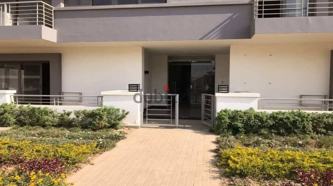 Apartment for sale in Taj City Compound, directly on Suez Road, in the heart of the Fifth Settlement, next to Madinaty 3