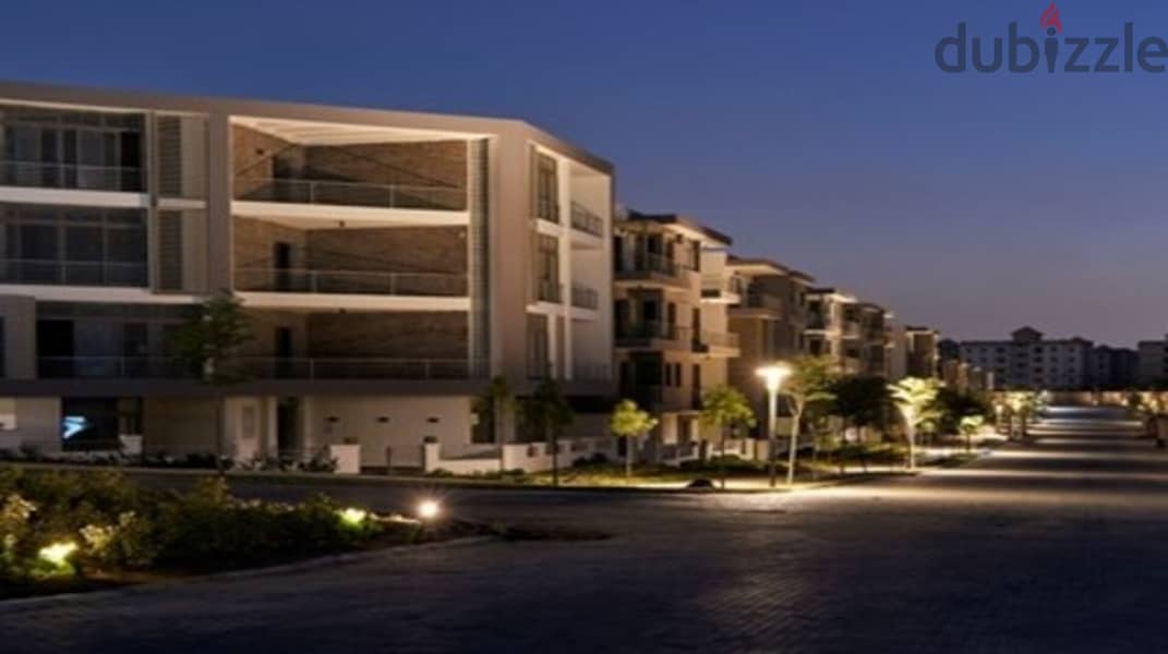 Apartment for sale in Taj City Compound, directly on Suez Road, in the heart of the Fifth Settlement, next to Madinaty 5
