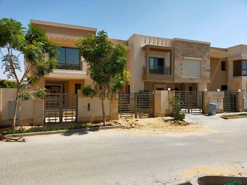 Duplex, 209 meters, landscape view, first settlement, minutes from Nasr City, in Taj City Compound 5