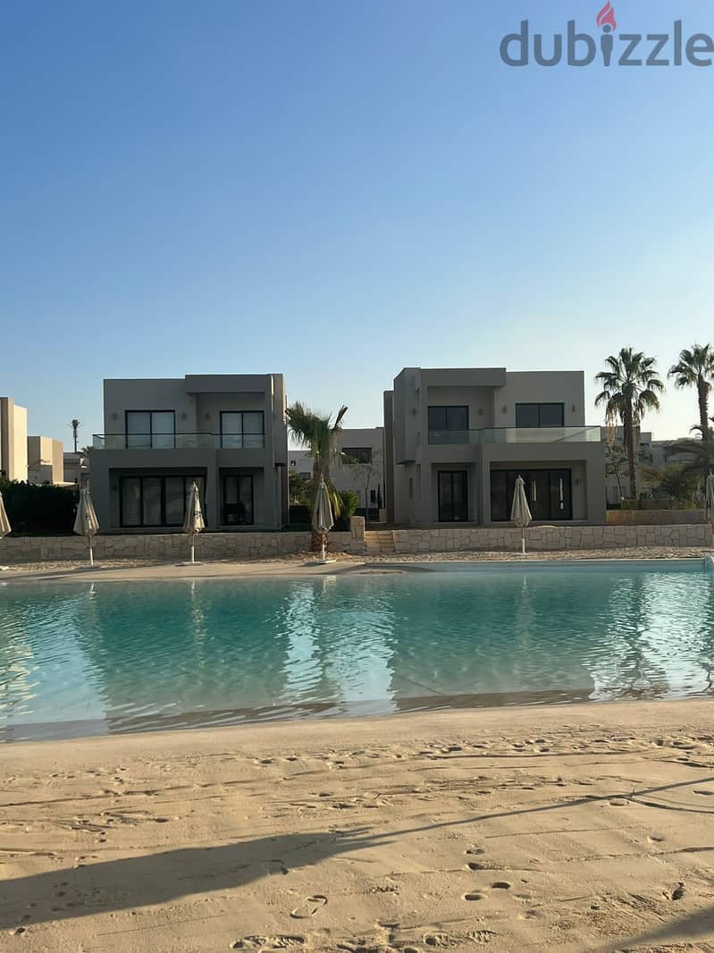 To reserve a 100 sqm chalet for sale with a check of 50 thousand, fully finished in Ras El Hekma Bay, North Coast, Azha Compound, North Coast 11