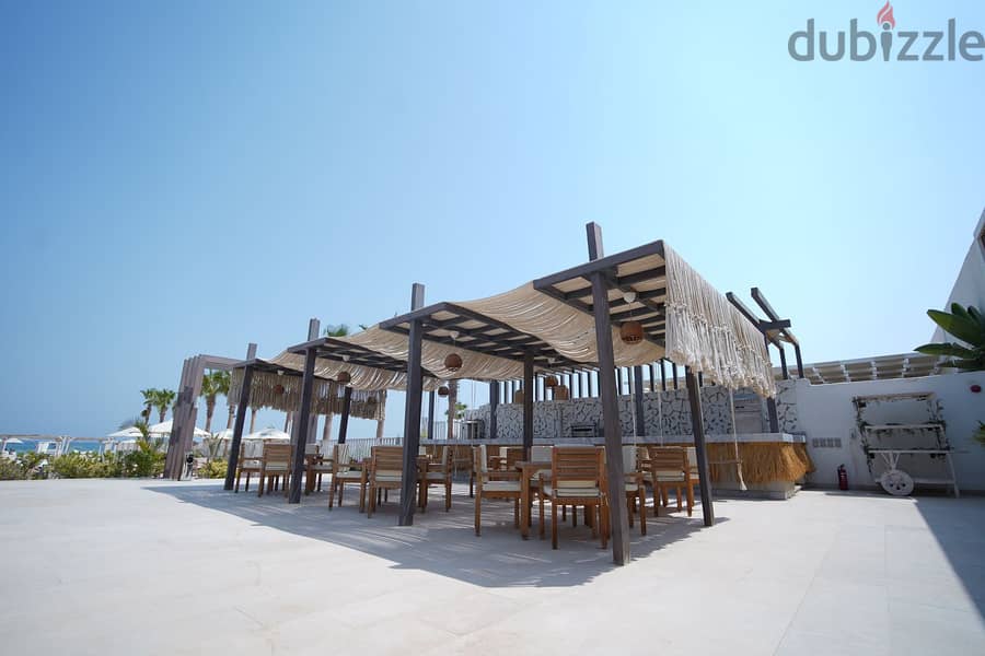 To reserve a 100 sqm chalet for sale with a check of 50 thousand, fully finished in Ras El Hekma Bay, North Coast, Azha Compound, North Coast 17