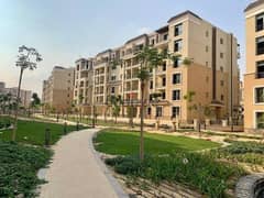 Apartment with a garden for sale crystal lagoon view on Mostakbal City | Sarai | MNHD in front of New Heliopolis beside Madinaty