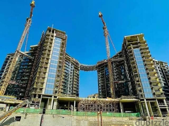 For sale, a large apartment with a wonderful view, fully finished + modifications, in Zed West Towers, Sheikh Zayed, next to Al-Ahly Club 4