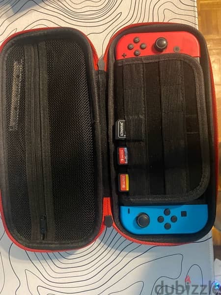Nintendo switch V2 with 3 games, 2 joysticks and carrier 2