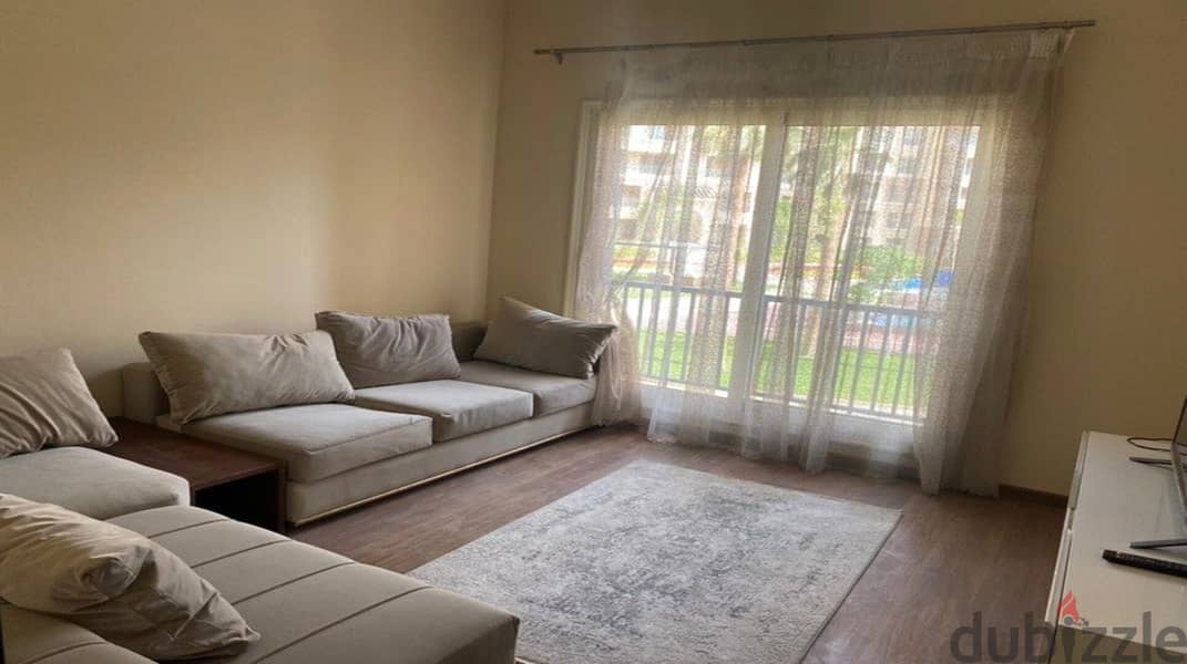 For sale, a fully finished apartment with a garden, 167 square meters, in a full-service compound in the Fifth Settlement 1