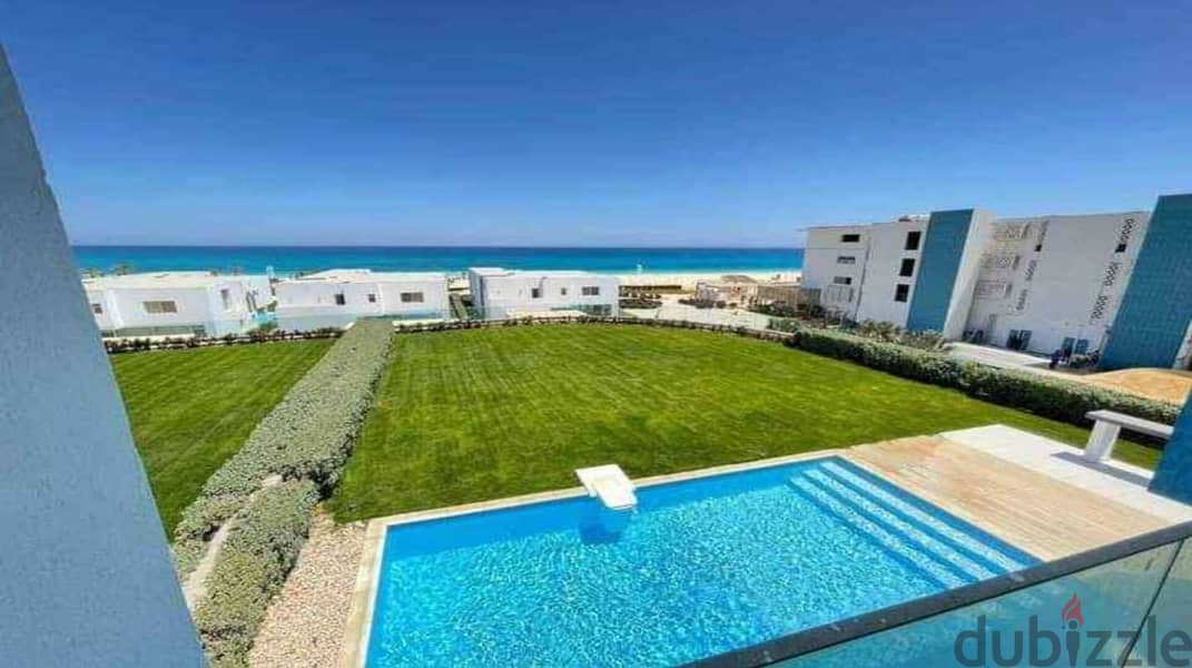 For sale, a hotel apartment overlooking the sea in the Ras El Hekma area, in a full-service village on the North Coast 1