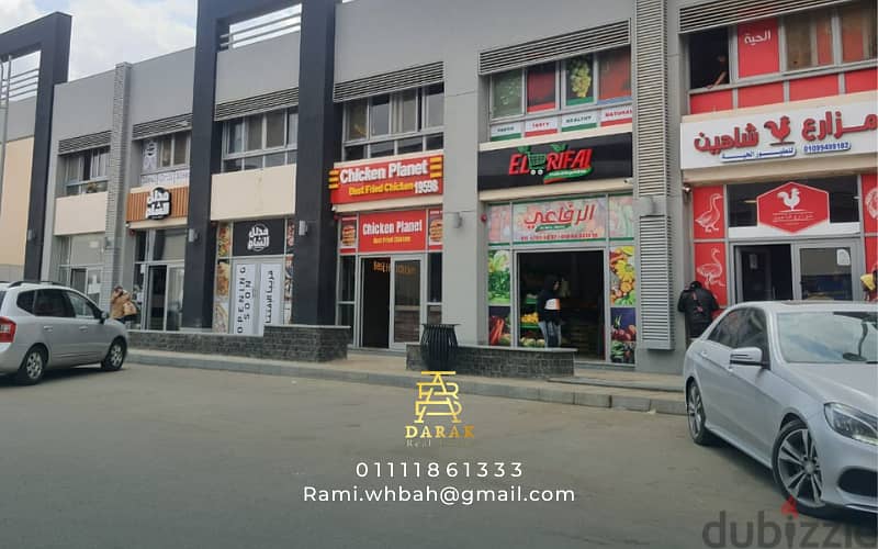 Shop for sale, 76 sqm, rented, first blocks in the Craft Zone, Madinaty, at the entrance to the market and the entrance to East Hub 3