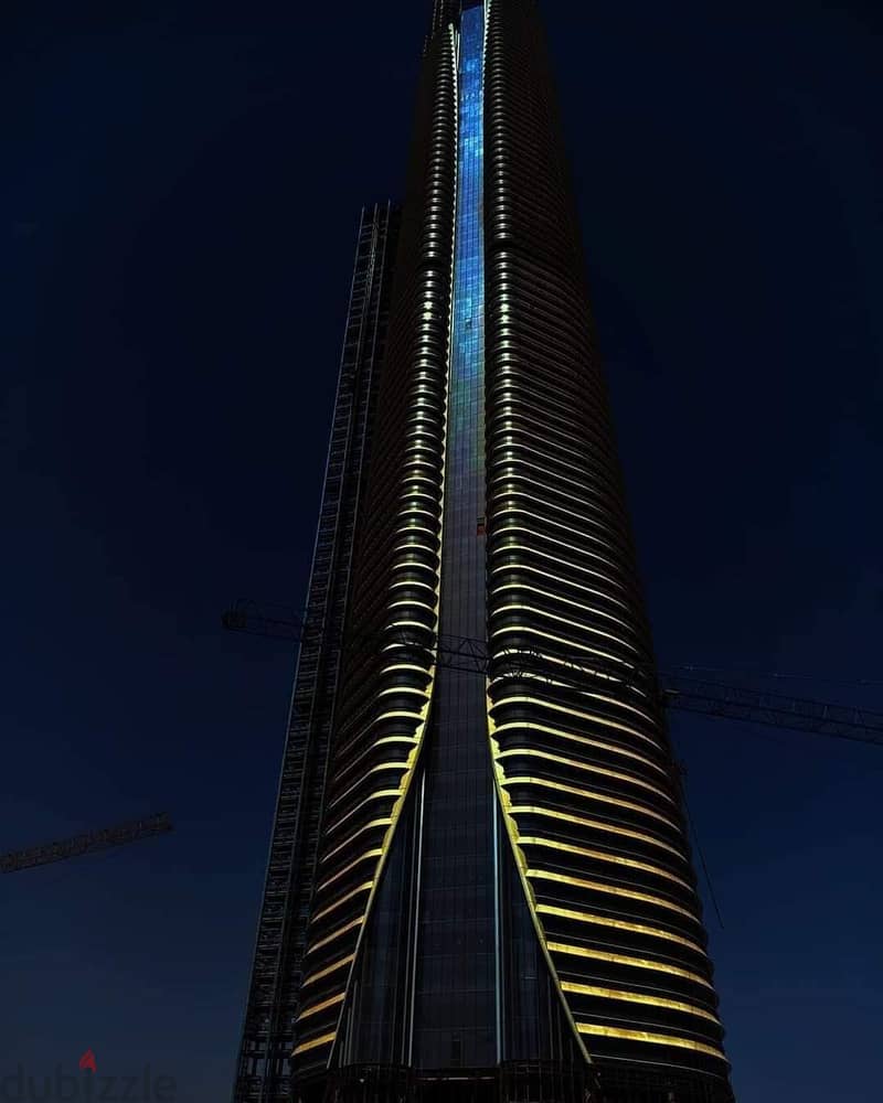 An administrative office in a skyscraper on the 43rd floor, first row in front of the entrance to the iconic tower, a panoramic view in the heart of t 9