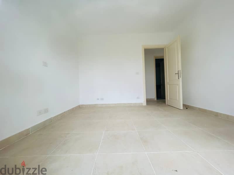 Ground Floor Apartment for Sale in Madinaty, B12 - 106 sqm with 55 sqm Private Garden, Open View of Wadi El Ghar 1