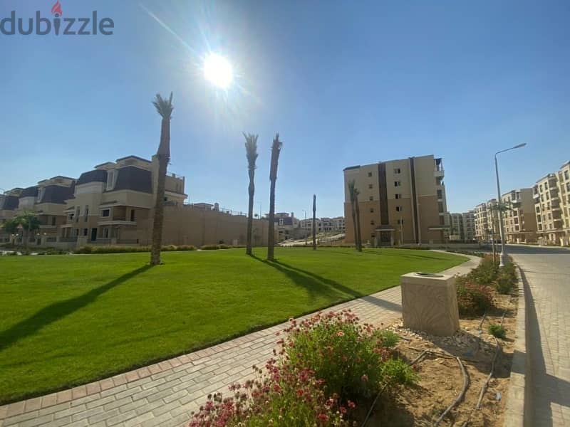 Apartment with a prime garden, 163 sqm, ready to move in sarai compound Mostakbal City 2