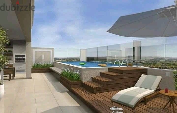 Own a finished penthouse with a private pool with air conditioners in the Fifth Settlement in Golden Square 11
