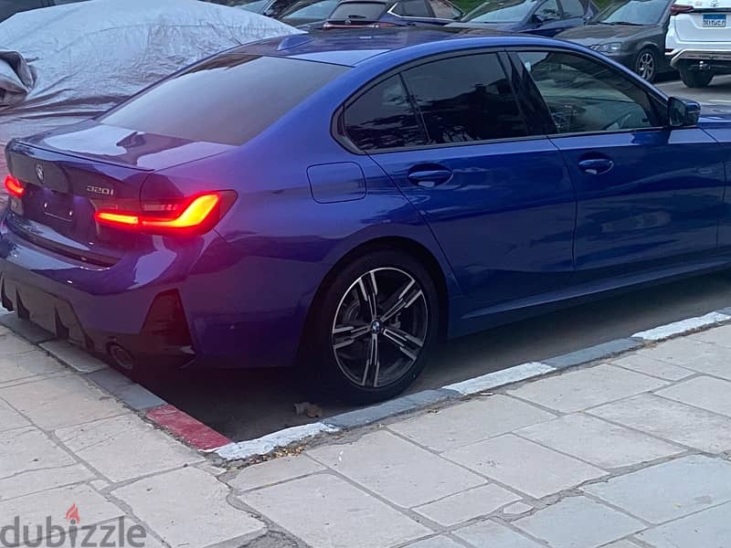 BMW 320 m sport blue red interior zero سعر محروق 2
