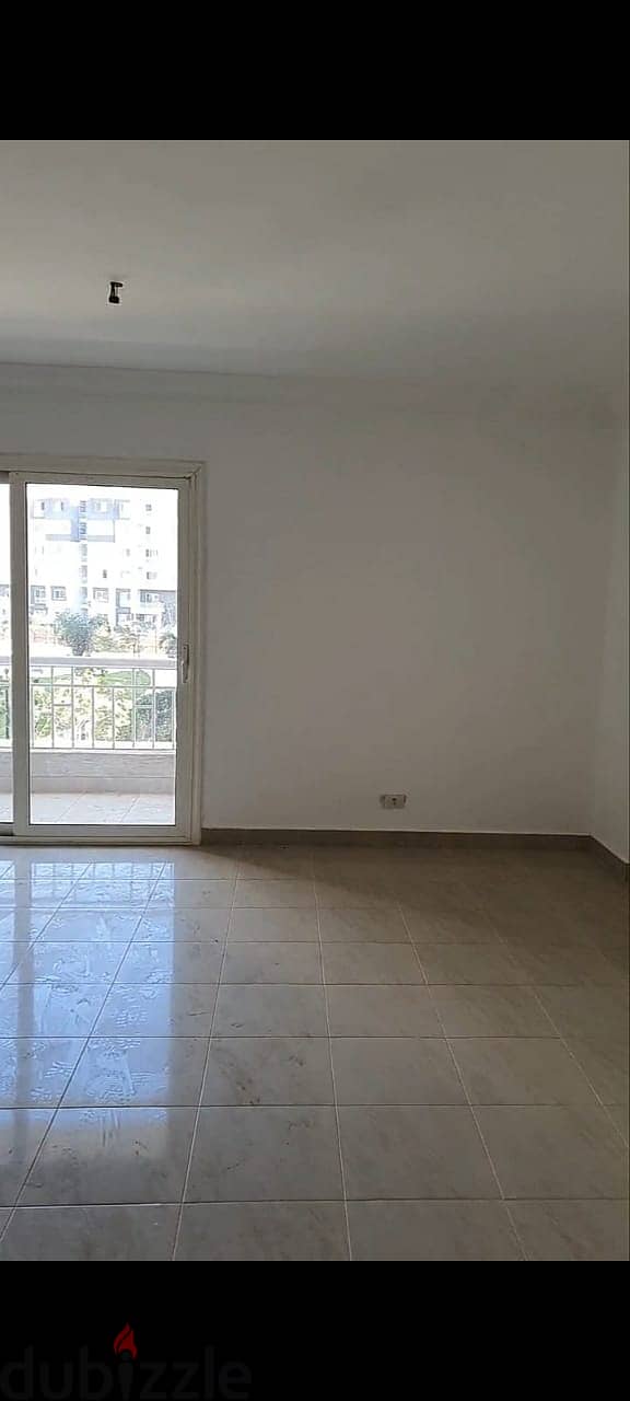 Apartment for rent B10 (Madinaty), on a wide garden, area 116 11