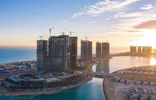 Distinctive apartment for sale in Al Alamein Towers, fully finished, with air conditioners, sea view, area of ​​150 alamin towers 6