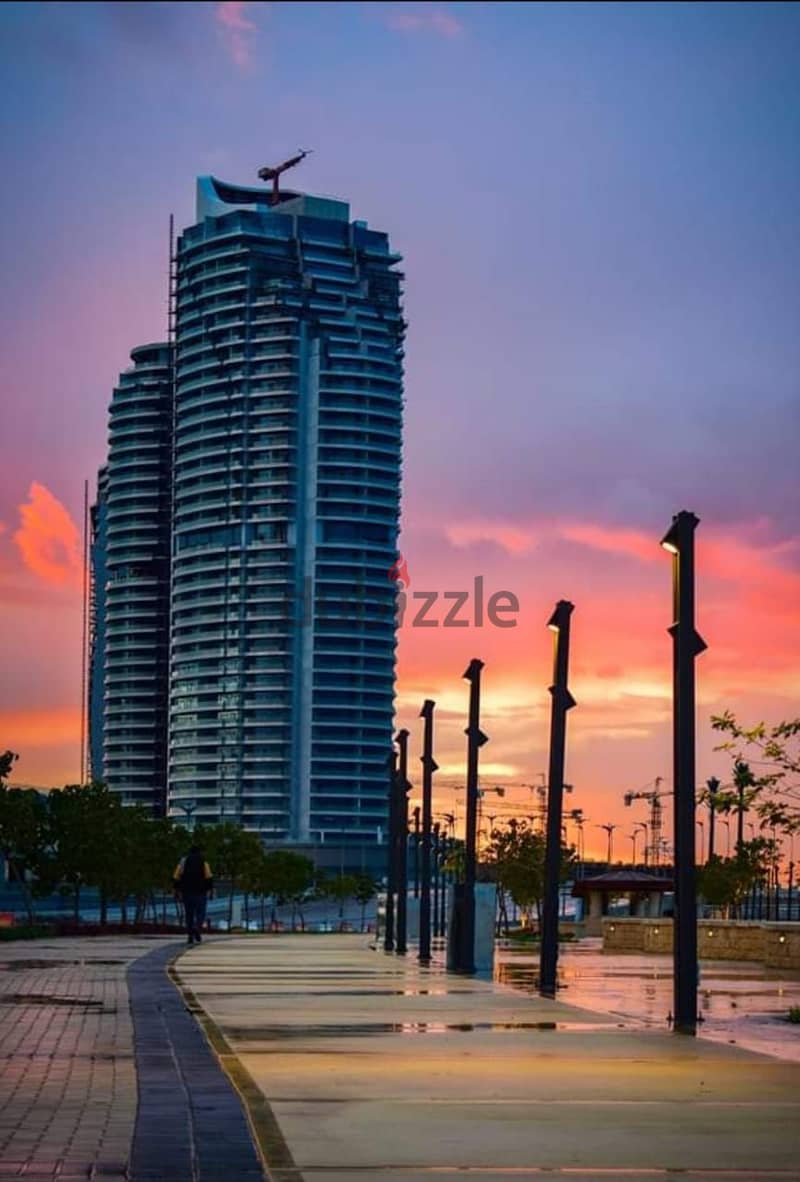 For sale, a distinctive apartment in Al Alamein Towers, fully finished, sea view, with an area of ​​​​200 meters, alamin towers 0