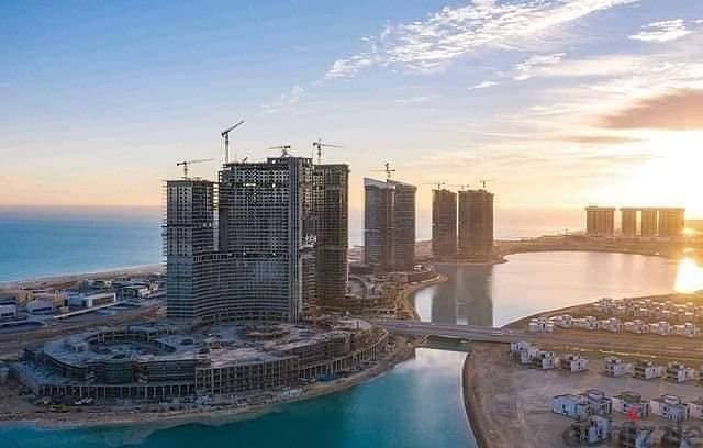 For sale, a distinctive apartment in Al Alamein Towers, fully finished, sea view, with an area of ​​​​200 meters, alamin towers 2