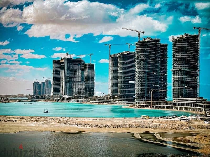 For sale, a distinctive apartment in Al Alamein Towers, fully finished, sea view, with an area of ​​​​200 meters, alamin towers 9