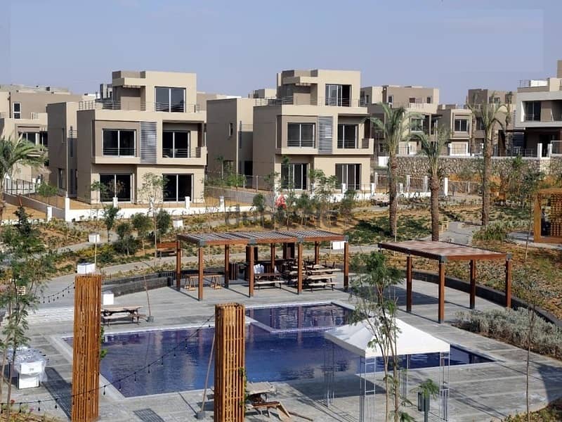 شقة بجاردن تطل على لاجون واسع للبيع في بالم هيلز القاهرة الجديدة 5