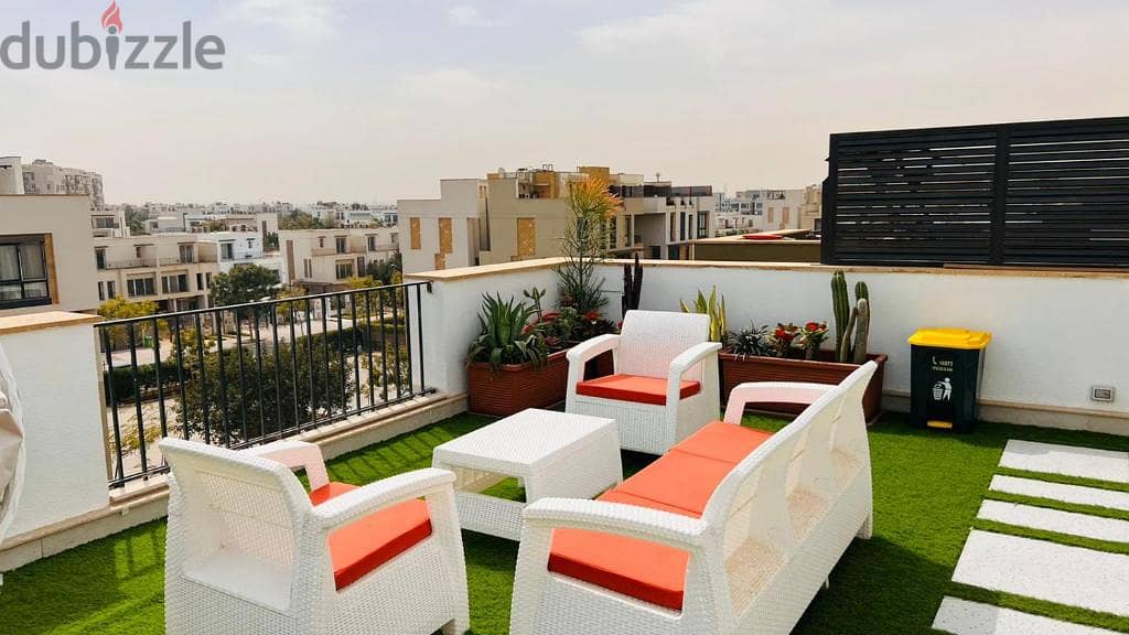 Townhouse villa for sale in Al-Shorouk | Sodic East | With a very distinctive division with roof swimming pool view and a panoramic view 4