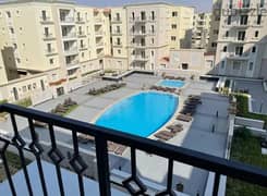 apartment view on pool 3 beds for sale in Mivida 0